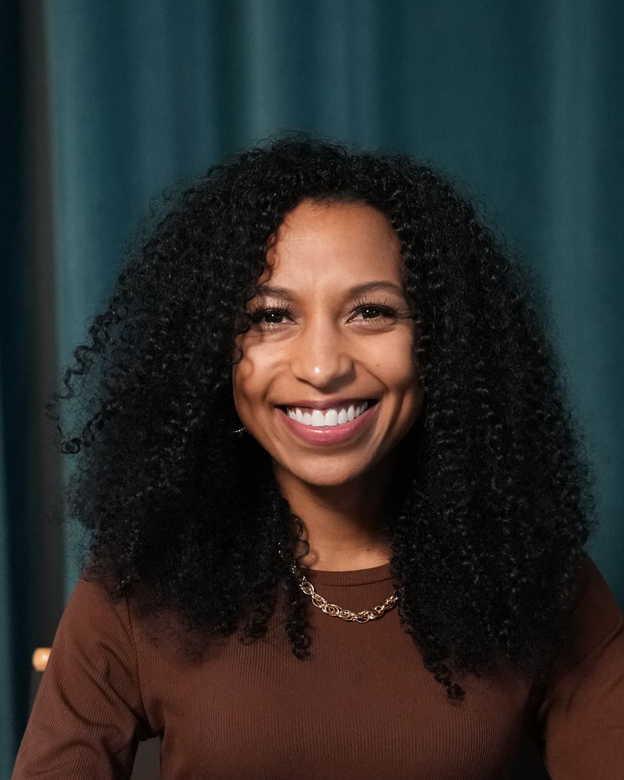 Studio portrait of Chelsea smiling