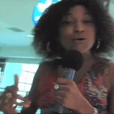 Looping clip: Chelsea on the mic inside the adidas store at Lenox Square